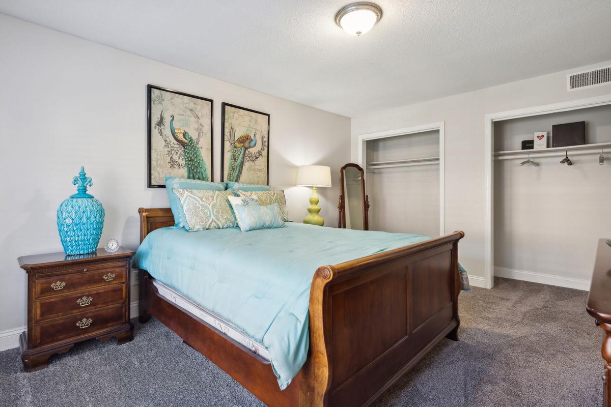 Bedroom in a Quail Run apartment home